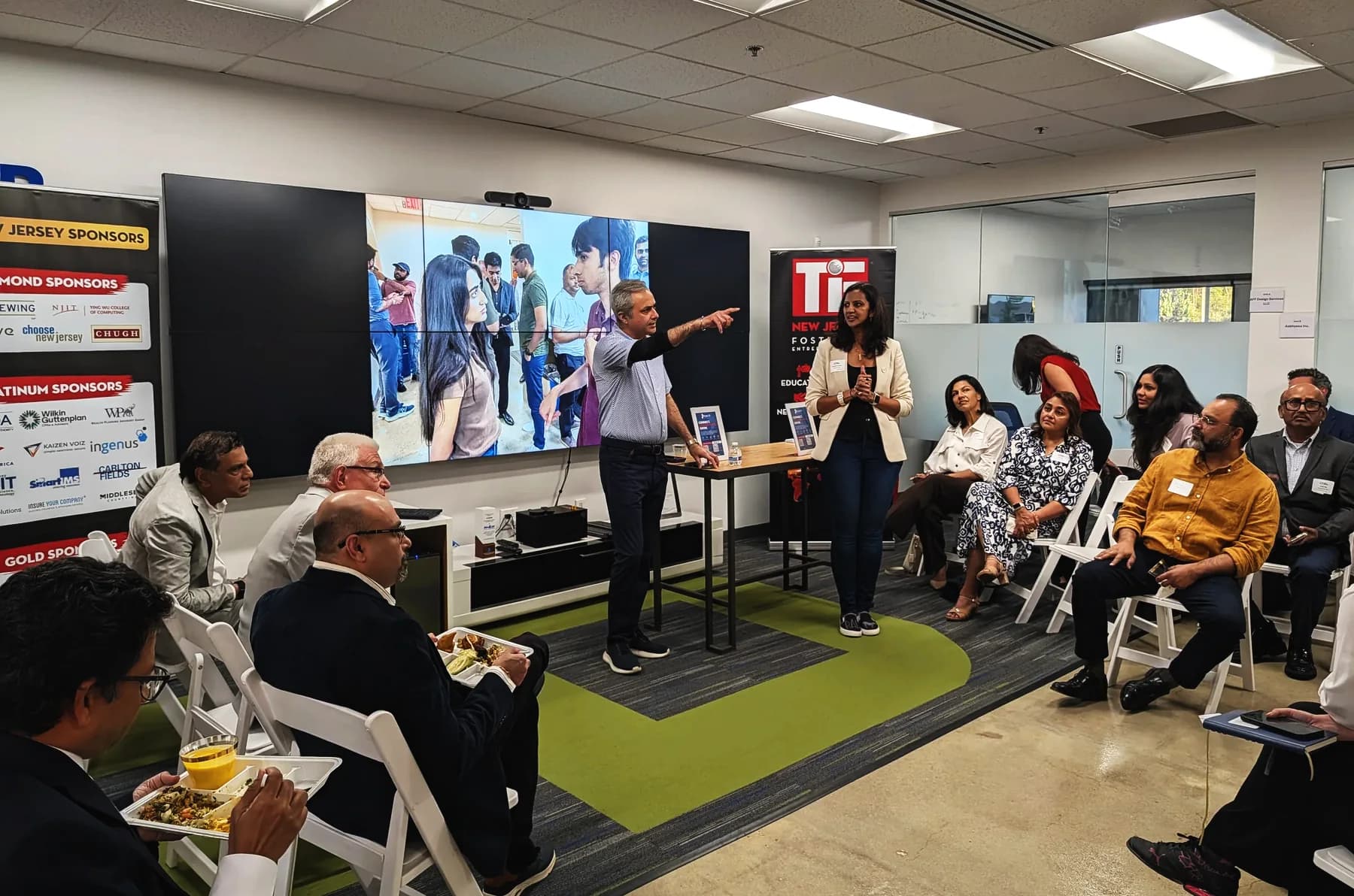 An audience listening during an Entry Open business event