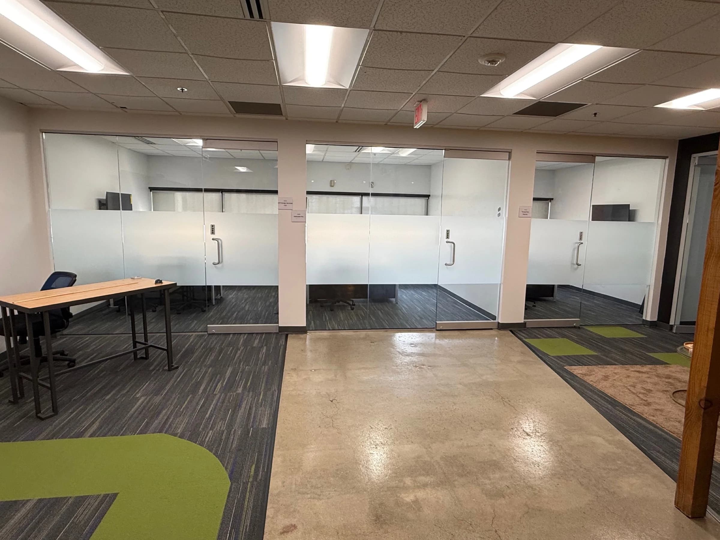 Private glass-fronted offices available inside the corridor