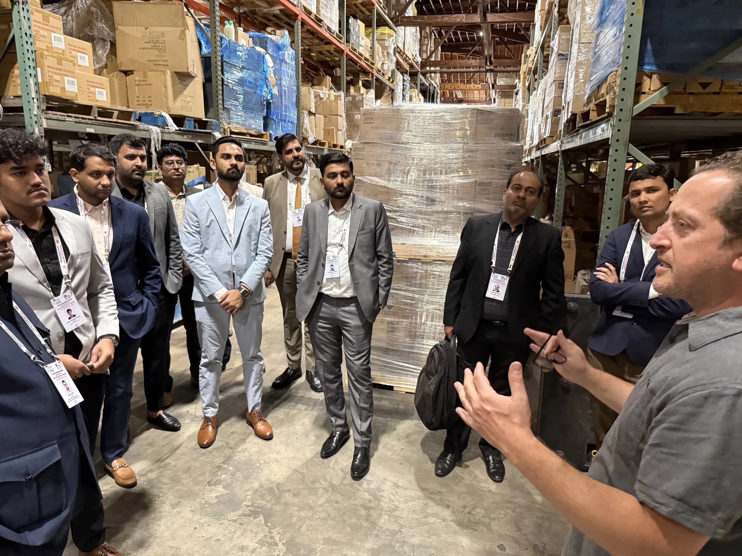 A business delegation inside a connected U.S. warehouse