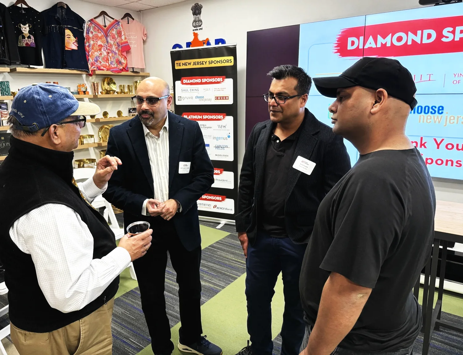 Visitors discussing a product on the showcase floor